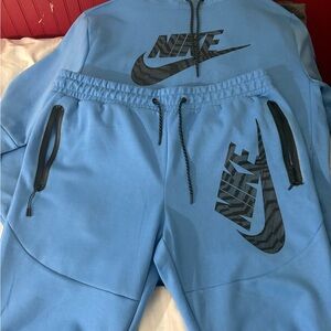 Nike Light Blue Tracksuit with Black Accents